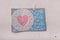 14 February Valentines day blue postcard with pink heart on white background