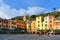 15.03.2018. facade of colorful old buildings and architecture with people walking on dock in small coastal village Portofino in Li