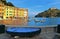 15.03.2018. facade of colorful old buildings and architecture with people walking on dock in small coastal village Portofino in Li