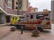 15 2 2022 Heavily protected and equipped medical staff and Ambulance waiting to pick up a covid-19 or omicron patient near a