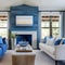 15 A beachy, coastal-inspired living room with a mix of blue and white upholstery, a large fireplace mantle with coastal decor,