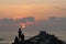 15 Feb 2021, Serenity Beach, Pondicherry, India. Silouettes of tourists watching Sunrise