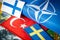15, May, 2022, Turkish flag next to the flags of Finland and Sweden Concept of a political conflict between a member of the North