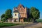 15th century St. Michael fortified church and bell tower in Synkovichy village, Grodno region, Belarus.