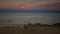 16:9 Super Moon Rising off center in a Pastel Seascape