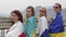 17-04-2022 TURKEY, ISTANBUL: women wrapped in the flags of Kazakhstan, Russia, Ukraine, and Belarus standing in the row