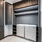 17 A laundry room with a mix of white and gray finishes, a large, built-in drying rack, and a mix of open and closed storage4, G