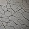 1789 Cracked Concrete Texture: A textured and weathered background featuring cracked concrete texture with rugged patterns and a