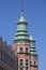 17th century building of Great Armory, arsenal in mannerist style, two towers on a background of blue sky, Gdansk, Poland