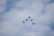 18 AUGUST 2019 KAZAN, RUSSIA: five military fighter jets flying in the cloudy sky in checkmark shape