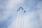 18 AUGUST 2019 KAZAN, RUSSIA: five military fighter jets flying in the cloudy sky in checkmark shape