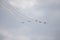 18 AUGUST 2019 KAZAN, RUSSIA: five military fighter jets flying in the grayish sky and performing a show