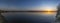 A 180 degree panorama of a sunset with beautiful colors at lake Zoetermeerse Plas, the Netherlands