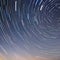 1805 Celestial Shooting Stars: A mesmerizing and celestial background featuring shooting stars, celestial trails, and a starry n