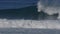 180p slow motion clip of a surfer getting a tube ride at backdoor pipeline on the island of oahu in hawaii