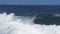 A 180p slow motion shot of surfers at banzi pipeline in hawaii