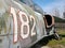 182 number painted on an old plane