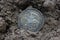 1843 Mexican Libertad Silver Coin on Ground in Dirt Back View