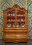 18th century cabinet filled with porcelain