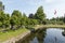 18th century day at Gammel Estrup Castle, the park behind the castle, grass and trees