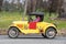 1927 Ford Model T Roadster driving on country road