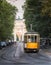 1930s-style Milan, Italy tram in front of the Arco Della Pace Peace Arch with Castello Sforzesco in the background