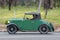 1937 Austin 7 Ruby Roadster driving on country road