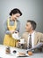 1950s style couple having breakfast