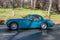 1953 Jaguar XK 120 Coupe driving on country road