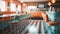 1970\\\'s retro style diner with checkered floor and red stools. Empty business with no people