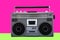 1980s Silver retro radio boom box on color background