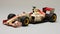 1997 F1 Car With Flaming Graffiti: Intricate Minimalism In Light Red And Dark Beige