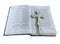 19th Century old bible and cross isolated over white