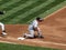 1st baseman Kevin Youkilis puts food on the base