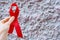 1st December, World Aids Day concept with shiny red ribbon awareness.