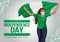 1st October Nigeria Independence Day. young girl running with holding Nigeria flag in her hands behind. vector illustration1st