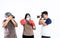 2 Asian man photographers taking pictures of woman Wearing a surgical masks Doing exercise with boxing