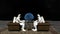2 astronauts playing chess on the moon in comfy leather chairs