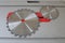 2 circular saw blade disc on table saw background