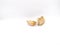 2 cloves of garlic on a white background