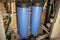 2 coarse water filters in a blue bottle