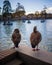 2 Egyptian geese looking at the boats on the pond in the Retiro park