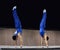 2 gymnasts on parallel bars