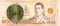 2 new thai baht coin against 1000 new thai baht banknote