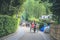 2 Nov 2013 Unidentified man with a rickshaw and tourists at Chikurin-no-michi