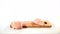 2 pieces of raw chicken fillet falls on a wooden board, than taken from a wooden plank by hand, slow motion