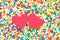 2 Red heart surrounded by colourful candy balls