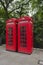 2 red telephone boxes