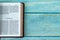 2 Samuel open Holy Bible Book on a rustic wooden background with copy space