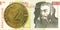 2 slovenian tolar coin against 10 slovenian tolar banknote